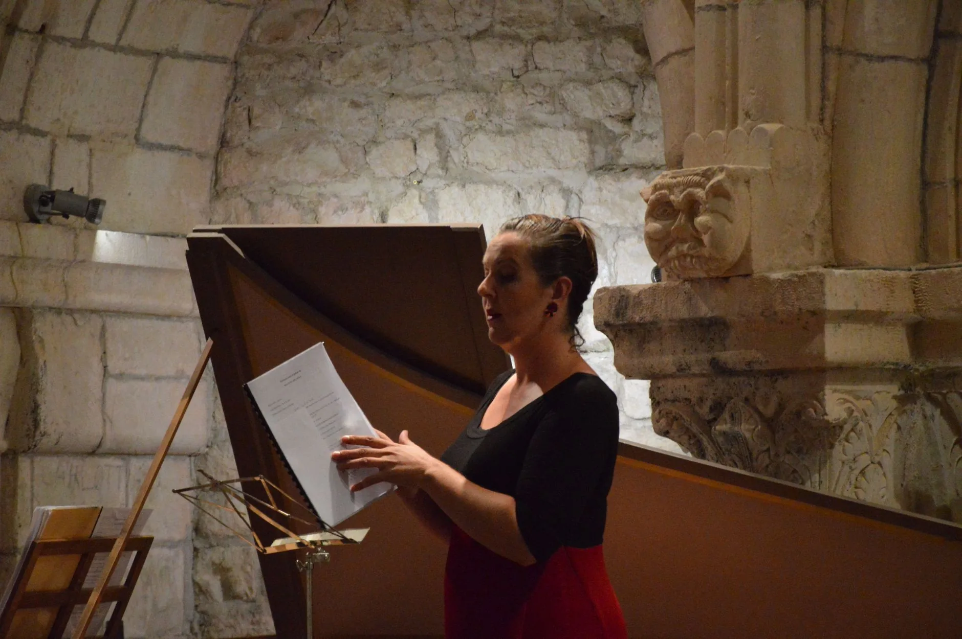 Composer at grand piano, sheets of music scattered, soft muted lighting, blending eras.